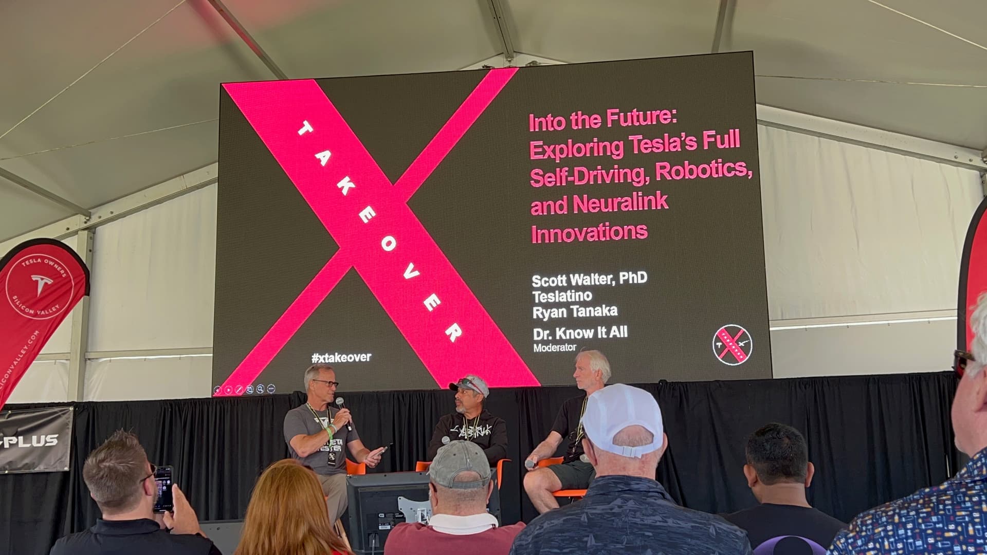 John L. Gibbs on stage during an AI and technology panel discussion